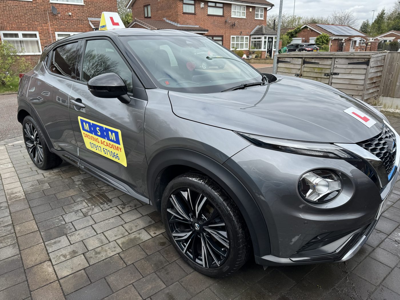 MSM Driving Academy's grey Nissan Juke tuition car with an L-plate roof sign