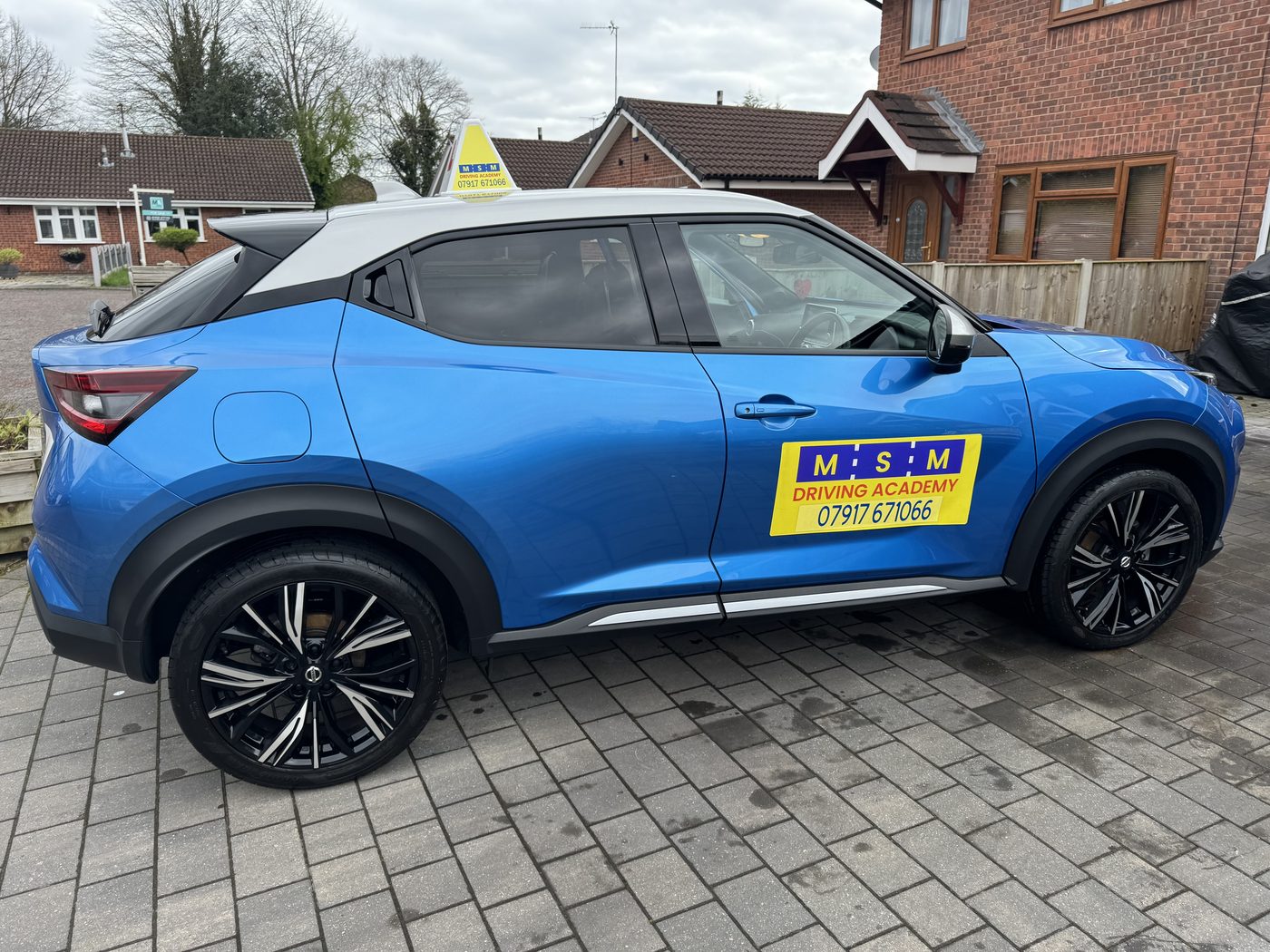 MSM Driving Academy's blue Nissan Juke tuition car with a white roof